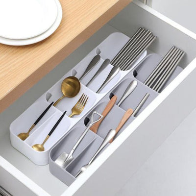 range couvert dans tiroir blanc gris